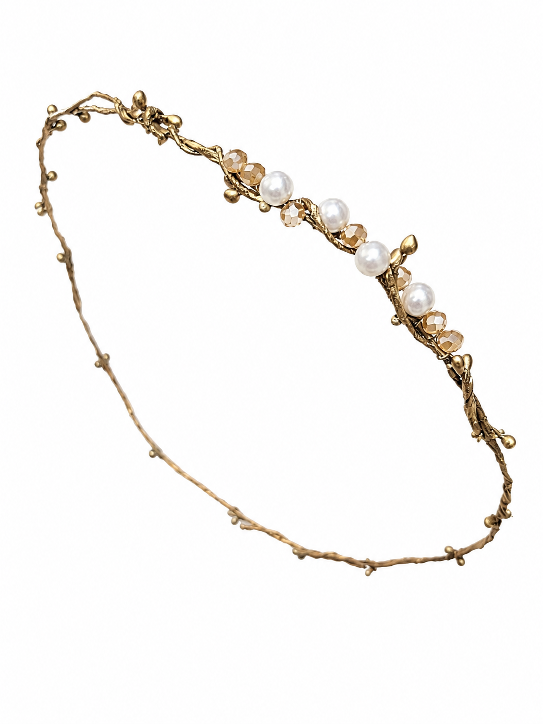Gold necklace with pearls on a white background
