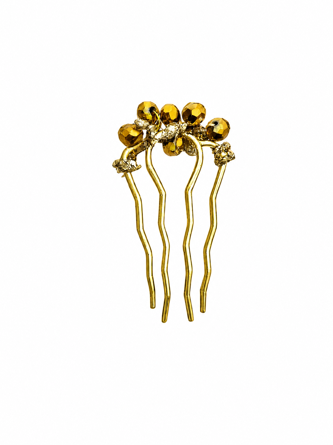 Gold hair comb with decorative elements on a white background