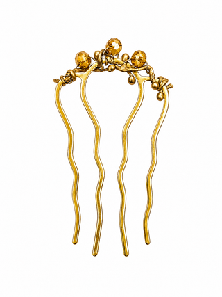 A gold hair comb with four long wavy prongs and decorative gold beads and floral details at the top, shown on a plain white background.