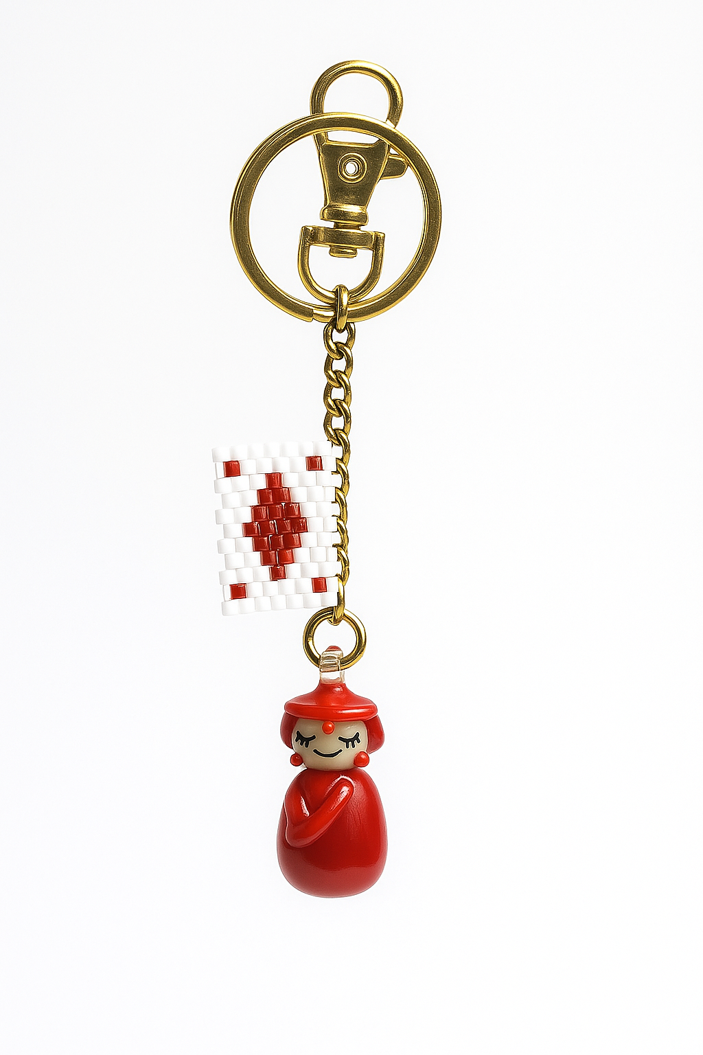 Handmade keyring with red doll glass pendant and beaded Ace playing card charm on gold-plated stainless steel chain