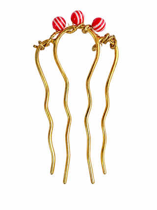 Handmade brass French hair comb with red lollipop-inspired beads, flexible design for most hair types